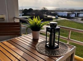 Quartier S&uuml;dstrand - Ferienwohnung mit Meerblick，位于费马恩的海滩酒店