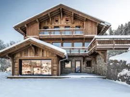 Le Grand V, chalet de luxe avec piscine intérieure