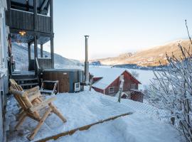 Stamp and sauna! Small farm with fantastic view!，位于Favang的酒店
