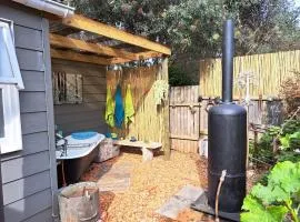 Petlyn eco cottage is an off grid petfriendly cottage with an outdoor tub