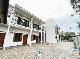 Kmanda House