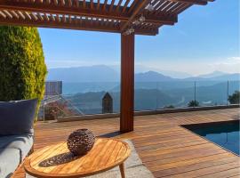 Family suite with garden and amaizing view to Lugano，位于卡迪马里奥的酒店