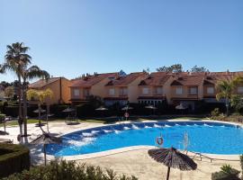Adosado playa Islantilla campo de golf，位于伊斯兰蒂拉的酒店