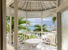 Pampered In Paradise Columbus Heights 2 BR penthouse condo near Ian Fleming airport