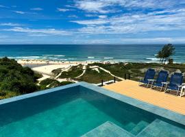 Casa Oceano Praia do Rosa, apartamentos pé na areia, Praia do Rosa，位于普腊亚罗萨的酒店