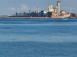 Appartement Havenzicht, gelegen aan zee met zeezicht