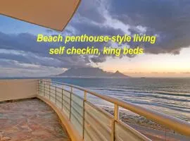 Beach penthouse-style living,self checkin,king beds