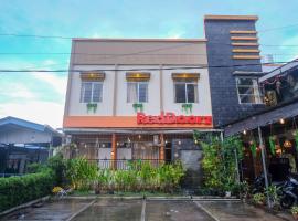 RedDoorz near Jalan Wolter Monginsidi Manado，位于美娜多的酒店