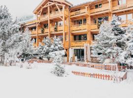 Hôtel Chalet Mounier，位于莱德萨阿尔卑斯迪亚布勒滑雪缆车附近的酒店