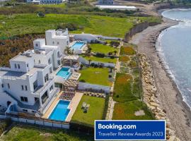 BLUE CORAL BEACH VILLAS three exclusive villas - Poseidon - Nautilus - Oceanos - and - Baby Coral bungalow，位于珊瑚湾的酒店