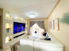 Siena Sun Luxury Suites，位于Erand的自助式住宿