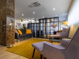 In Gold Hotel & Spa，位于阿格达的带泳池的酒店