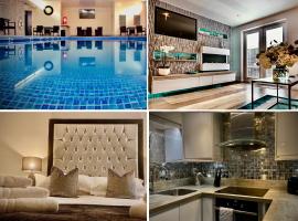 Sandpearl Suite Apartments，位于莱瑟姆-圣安妮的带泳池的酒店