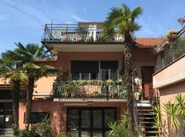 Appartamento con terrazza e posto auto Libri e Giardini