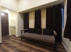 Sri Arangan Kudil Rooms，位于蒂鲁奇奇拉帕利的酒店