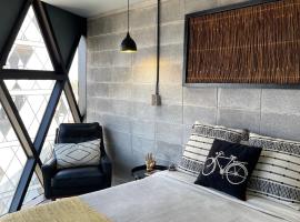 Loft industrial vista a los volcanes，位于乔卢拉的酒店