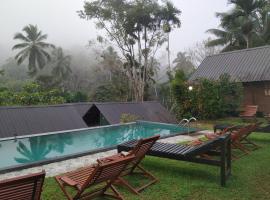 Rainforest Chalets - Rainforest Tours,Pool And Ac，位于代尼耶耶的度假村