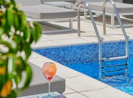 广场里尔套房酒店，位于罗萨里奥的酒店