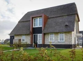 Beautiful villa with sauna and unobstructed view, on a holiday park in Friesland