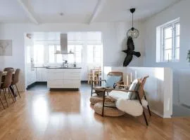 Ocean Views and Gorgeous Design in a Light-Filled 3 BDRM/1.5 Bath Village Home