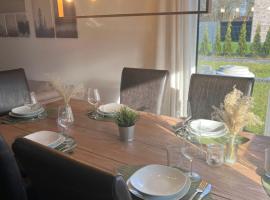 Ferienhaus Bella Haus am Harkebrügger See，位于Barßel的酒店