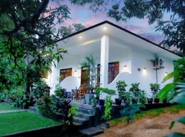 The Cattleya Guest House Sigiriya，位于锡吉里亚米内日亚国家公园附近的酒店