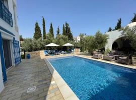 Villa des Oliviers Hammamet B&B，位于哈马马特的酒店