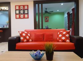 Homey Homestay，位于Tanjong Sepat的木屋