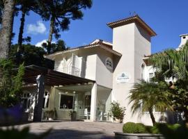 Doce Canela - Pousada de Charme，位于卡内拉的带泳池的酒店