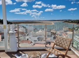 Rooftop Guesthouse Alvor，位于阿尔沃尔的旅馆