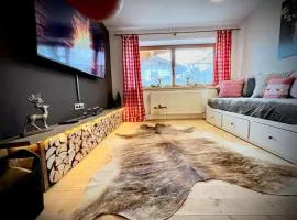 Ferienwohnung Steinbock Terrasse, Gartensauna, Garten, Grillplatz