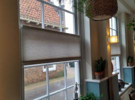 Bed & Brasserie Het Kosthuys，位于圣特马坦迪克的酒店