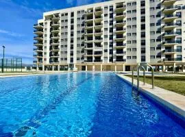 Apartamento con piscina padel y vistas al mar
