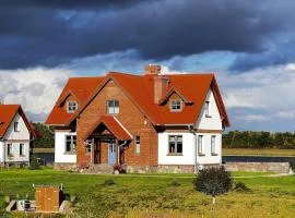 Mazurskie Wille - Willa Niebieska - siedlisko na Mazurach z bezpośrednim dostępem do jeziora Dejguny oraz prywatnym basenem