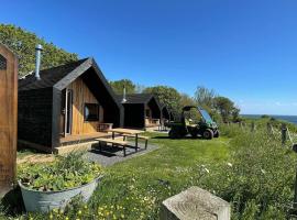 St Oswald Beach Hut Alnmouth，位于阿尔恩茅斯的酒店