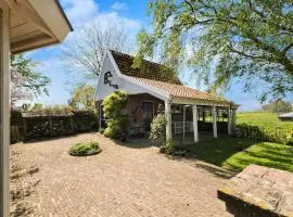 Idyllisch en knus huisje met prachtige veranda.