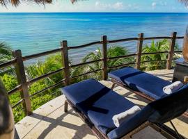 艾塔耶海滨沙滩公寓酒店，位于普拉亚卡门的酒店