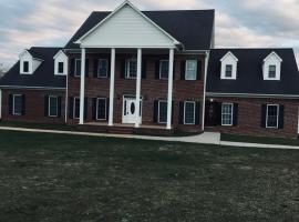MooreField Suites Greensboro East，位于McLeansville的酒店