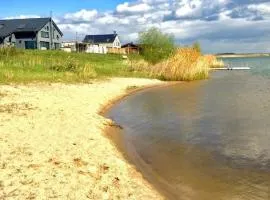 Ferienhaus / Ferienwohnung am Badesee nähe Leipzig mit Privatsstrand und Sauna