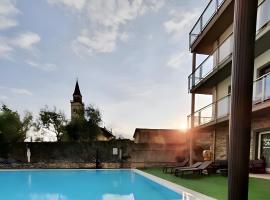 Alexandra's Sunset Apartment，位于多马索的酒店