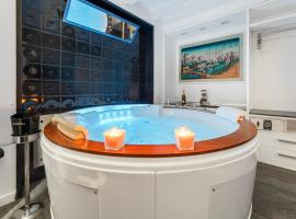 Ukiyo Suites And Rooms，位于卡利亚里的带热水浴缸的酒店