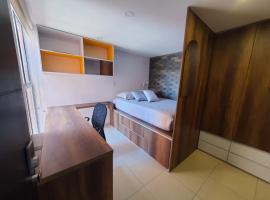 Habitaciones Privadas en apartamento Acceso a cocina equipada, baño y lavandería，位于通哈的酒店