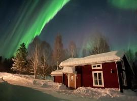 Bogärdan, cozy cabin by the Luleå River，位于哈拉斯的酒店