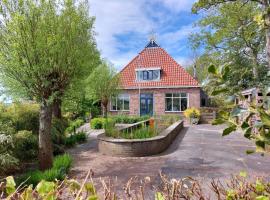 Luxe gastenverblijf in het hart van Friesland，位于阿克伦Akkrum Station附近的酒店