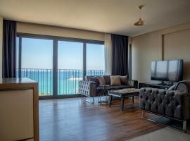 Duplex Loft mit Panorama Seaview，位于库萨达斯的海滩短租房