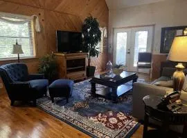 C18 - Lake view two bedroom, two bath loft, log-sided cottage with private hot tub overlooking Lake Ouachita
