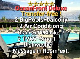OCEANFRONT DELUXE-45m,TRANSFE R-inc ! 600 mb, 2 Big POOLs,2AirCondition, 2TV-65",DISHWASHER,Lift,Amadores View !，位于库拉海滩的酒店