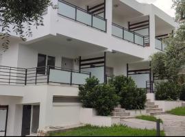 里扎别墅公寓，位于Riza的酒店