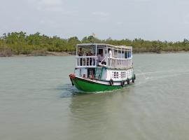 Tulip Stay with Paid Jungle Safari & Activities，位于Gosāba的酒店