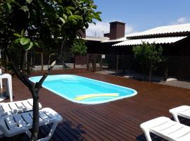 Lindo Residencial na Praia Itapeva Torres，位于托雷斯的酒店